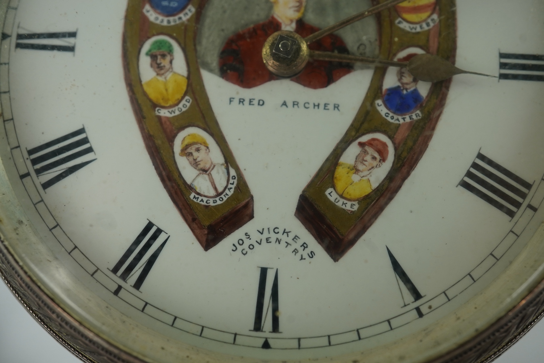 A late Victorian Horse Racing related engraved silver open faced keywind pocket watch, by J. Vickers, Leicester Road, Coventry, the enamelled dial with a signed painted bust of the jockey Fred Archer to the centre and fl